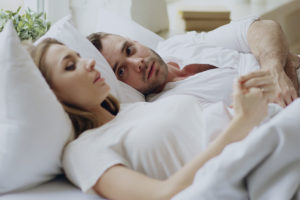 a couple lies in bed possibly Two addicts in a relationship