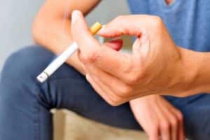 a person holds one of their Sober cigarettes