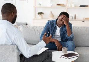 a person talks to a therapist during crack addiction treatment