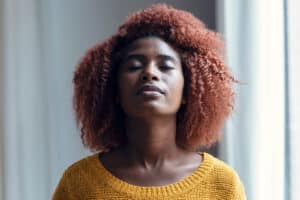 Person feeling common relapse triggers